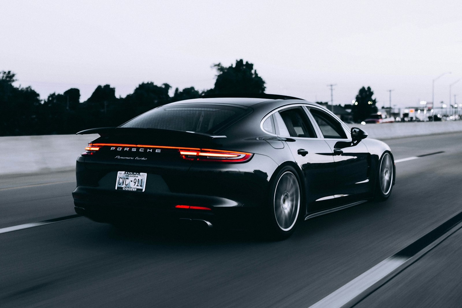 Silver sports car in a bright setting