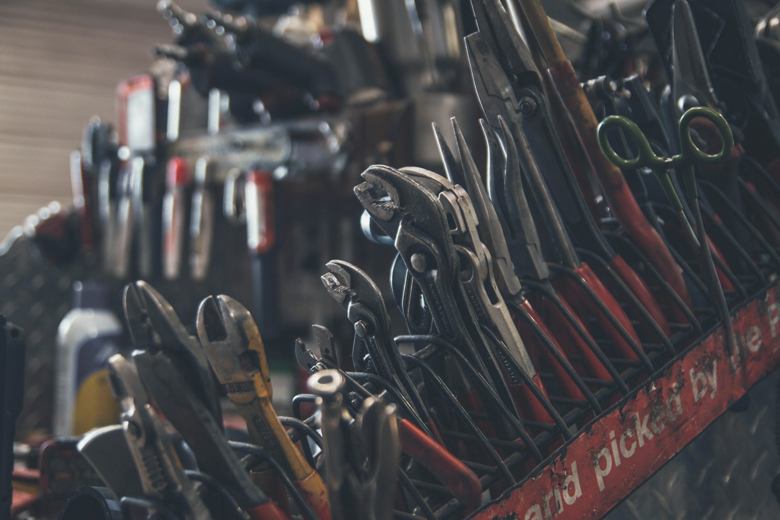 Hand tools arranged on a workshop bench